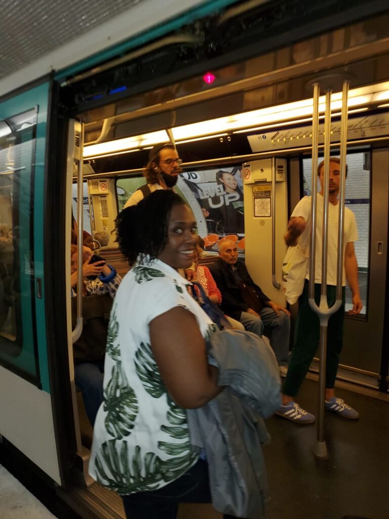 image of Af getting on a train in Paris